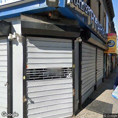 Thumbnail image of the front of a dentist office practice with the name Kings Dentistry which is located in Ozone Park, NY