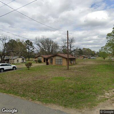 Thumbnail image of the front of a dentist office practice with the name Dental Care which is located in Crossett, AR